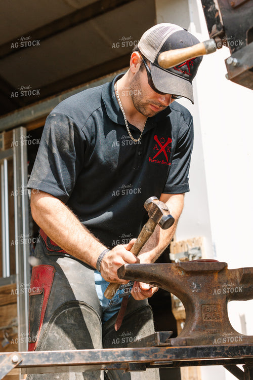 Farrier Making Horseshoes 52730