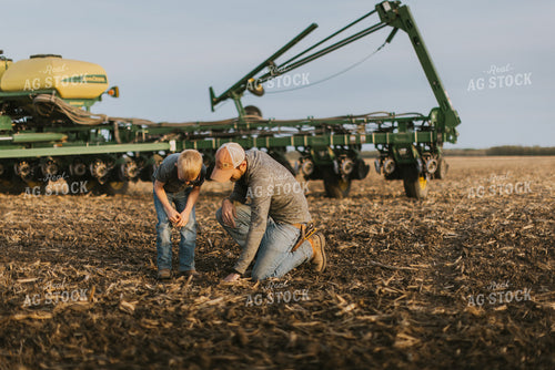 Farmer Checking Seed Depth with Son 8220