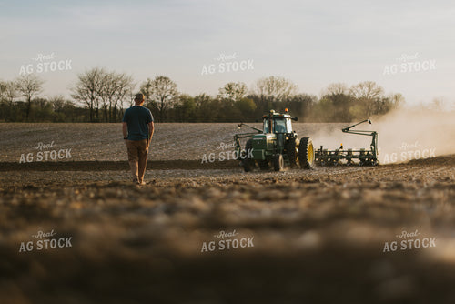 Farmer Walking Towards Planter 7442