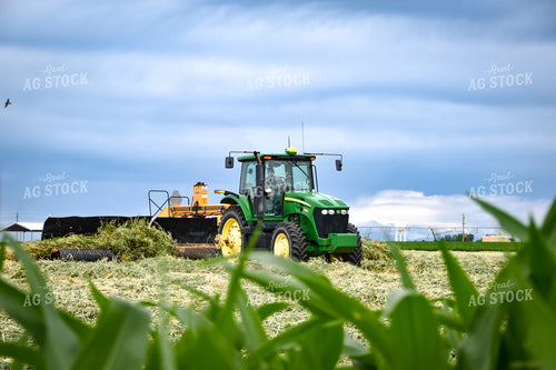 Tractor with Merger in Hay Field 56428