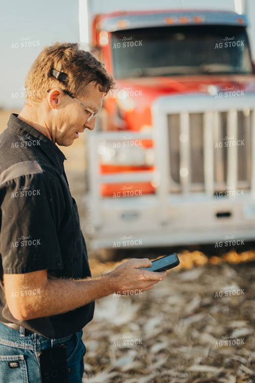 Farmer Using Phone by Semi 9477