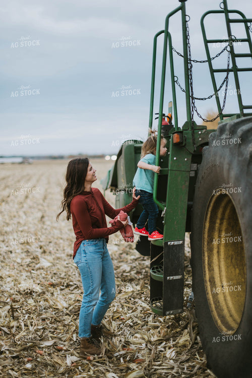 Farm Family Loading Kids into Combine 8626