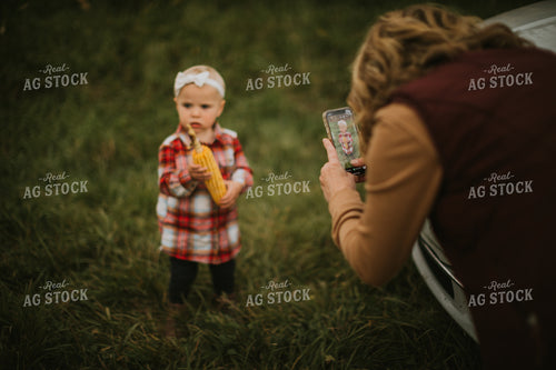 Farm Kid With Ear of Corn 6681