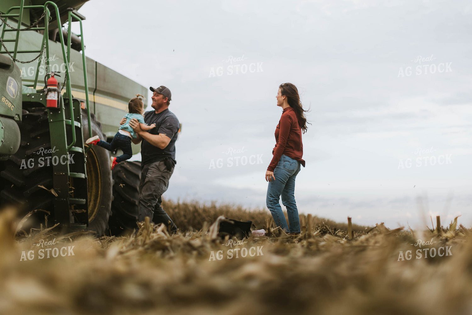 Farm Family Loading Kids into Combine 8563