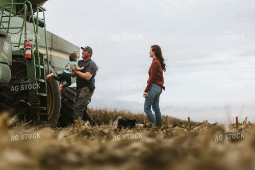 Farm Family Loading Kids into Combine 8563