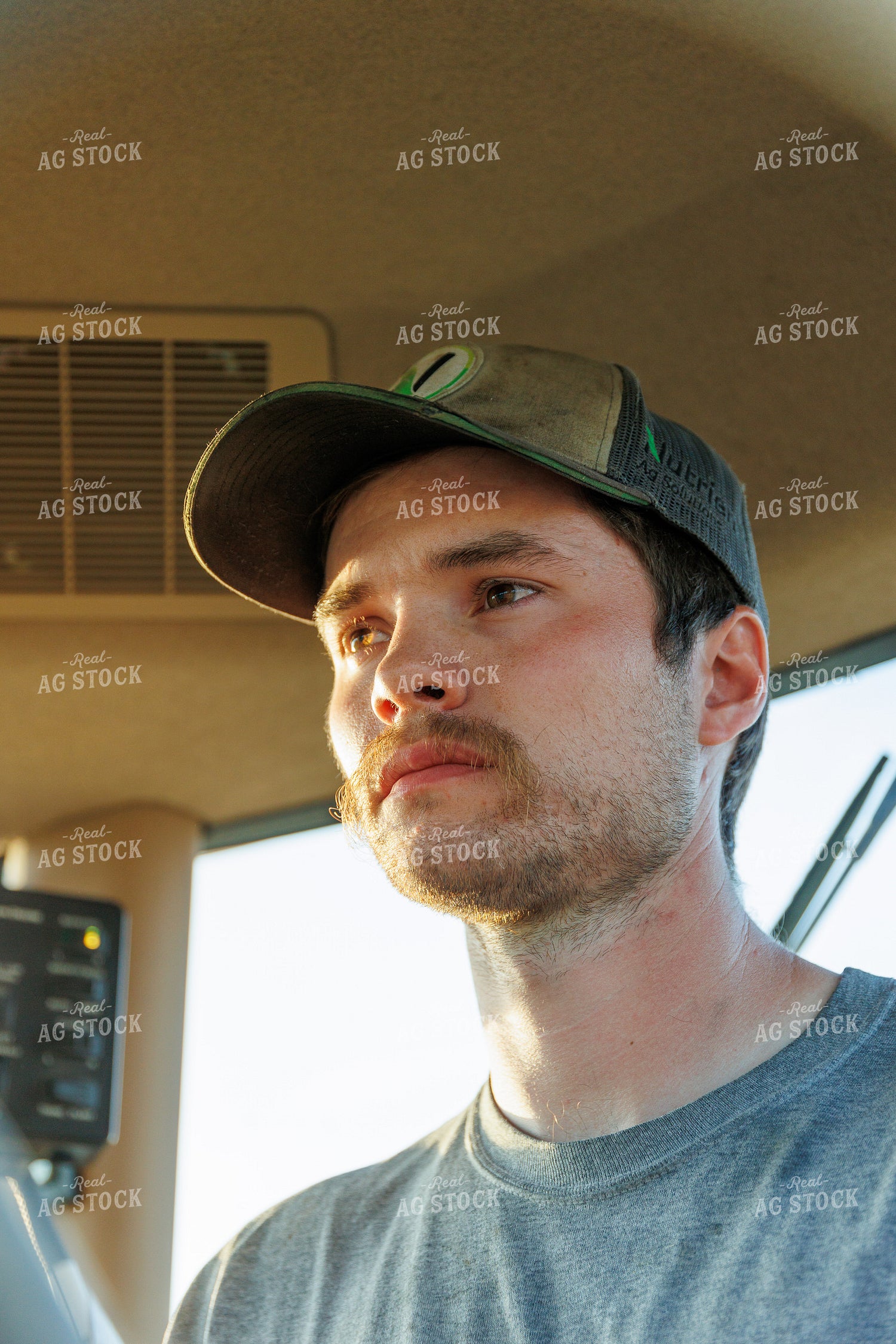 Farmer Operating Tractor 52631