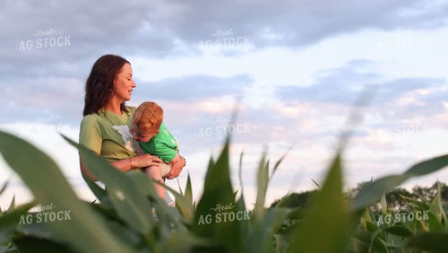 Farm Family Checking Corn 9176