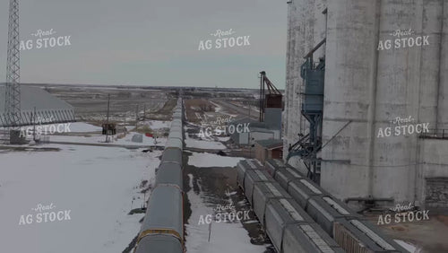Grain Terminal Alongside Train Tracks 239148