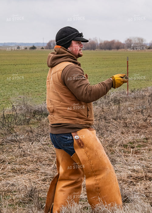 Rancher Fixing Fence 231061