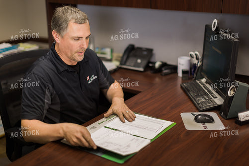 Retailer Working in Office 8069