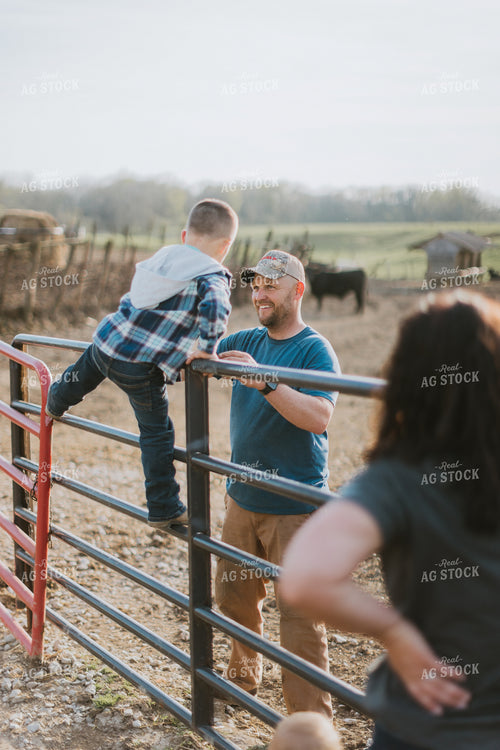 Farm Kid Climbing on Fence 7390