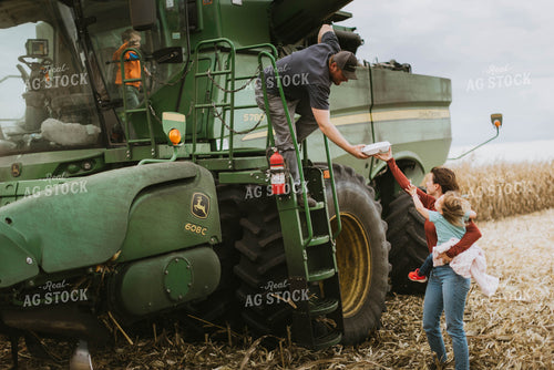 Farm Family Delivering Meals to Combine 8567