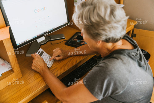 Female Farmer on Computer 8118