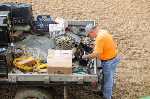 Farmer with Tools in Bed of Truck 52573