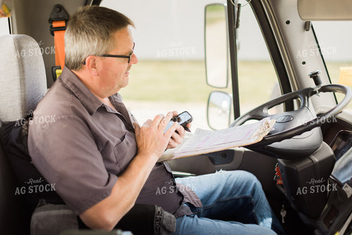 Farmer on Phone in Truck Cab 8044