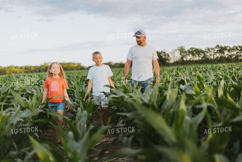 Farmer and Kids Checking Corn 8789