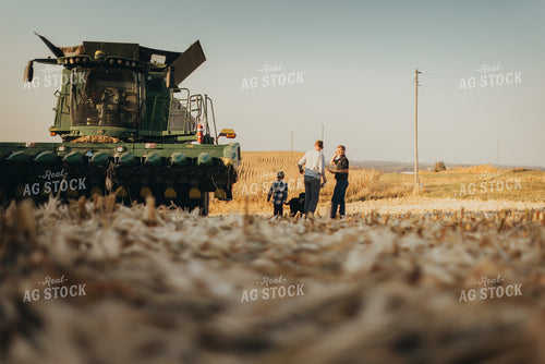 Farmer and Son Getting into Combine 9481