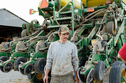 Farmer Preparing the Planter 52786