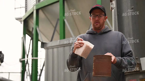 Farmer Testing Corn Moisture On-farm Storage - 469