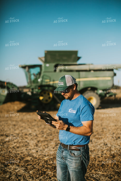 Farmer in Field With Tablet 7154
