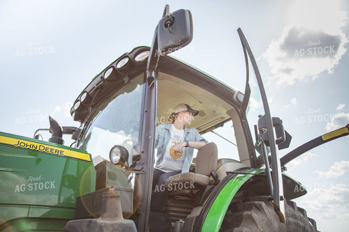 Farmer in Tractor Cab 161183