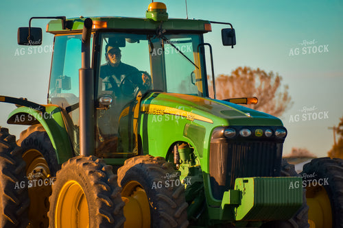 Farmer Driving Tractor 148029