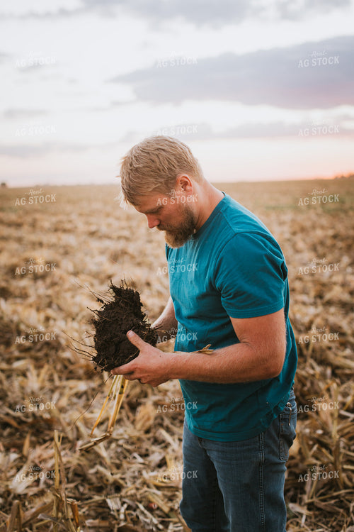 Farmer Checking Root Ball 9404