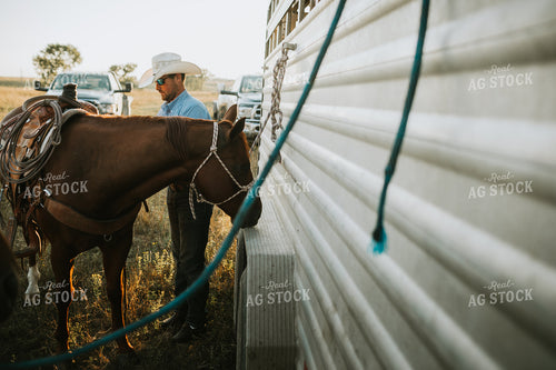 Rancher and Horse Near Livestock Trailer 6420