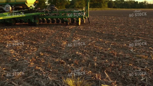 Climbing into Tractor with Planter 2957