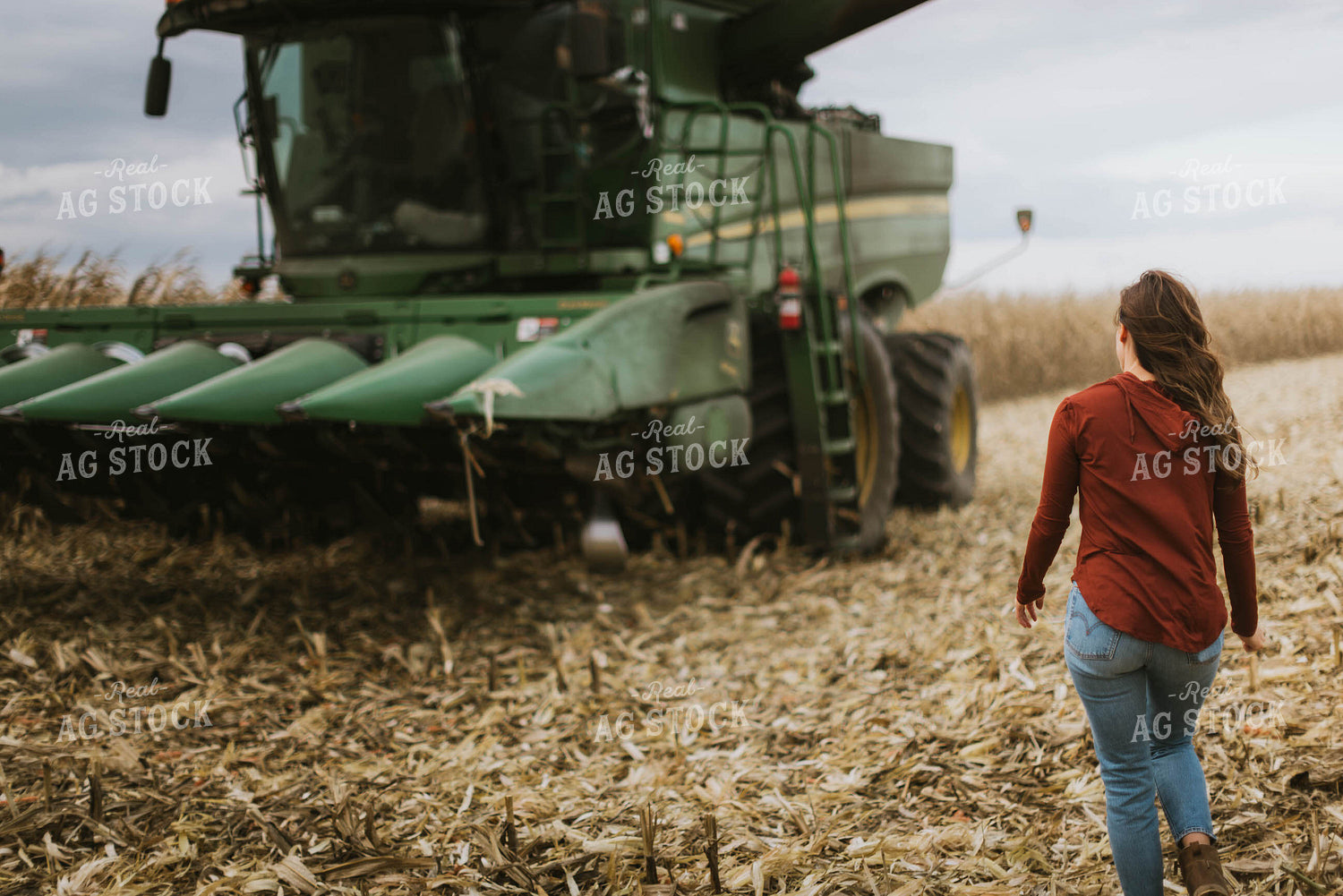 Female Farmer Walking to Combine 8558