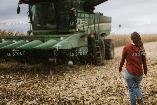 Female Farmer Walking to Combine 8558