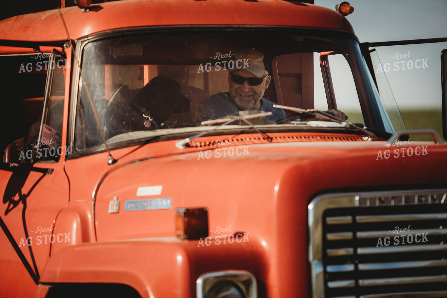 Farmer and Farm Dog in Tandem Water Truck 4370