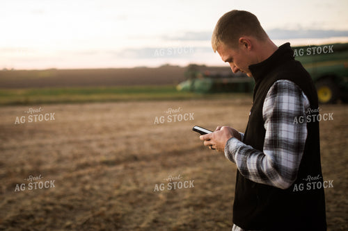 Farmer on Phone in Field 6851