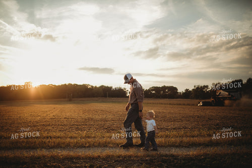 Farmer and Farm Kid Walking to Truck 4870