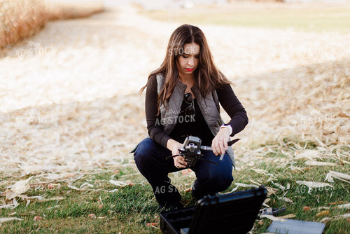 Female Appraiser Flying Drone 9446