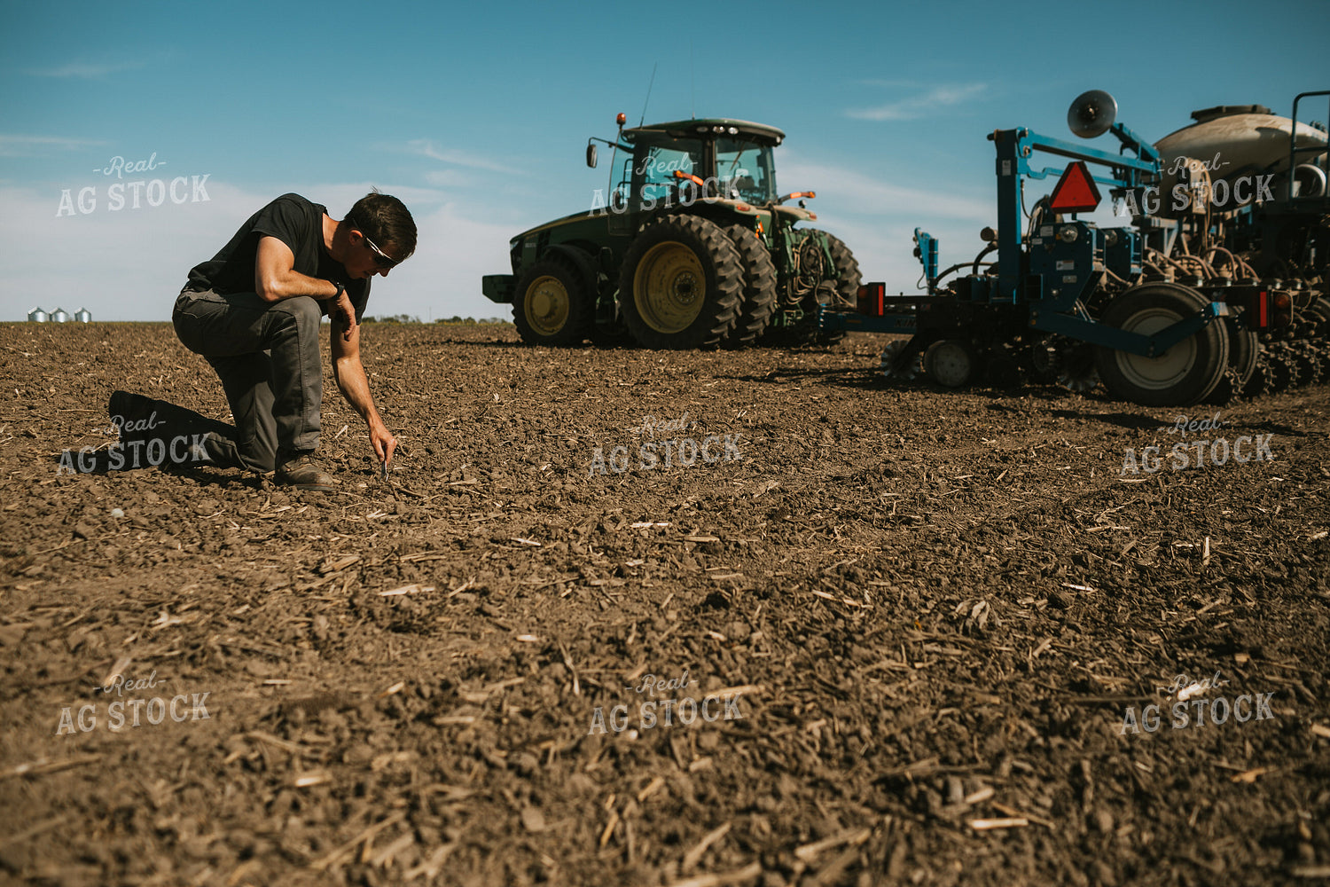 Farmer Checking Seed Depth 4105