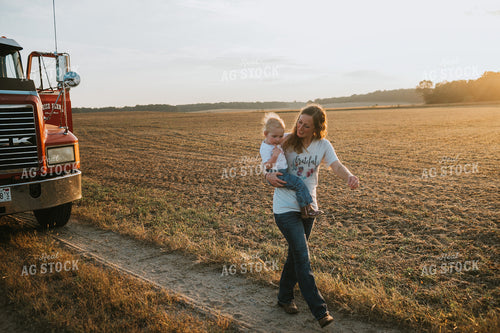 Farmer and Farm Kid Walking away from Truck 4875