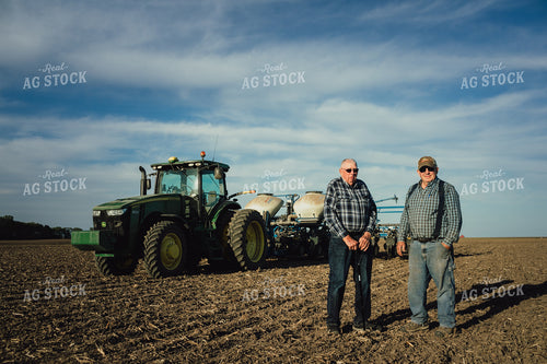 2 Generations of Farmers in Field at Planting 4226