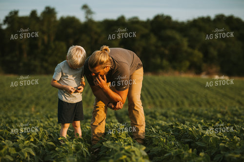 Farmer and Farm Kid in Soybean Field 6007