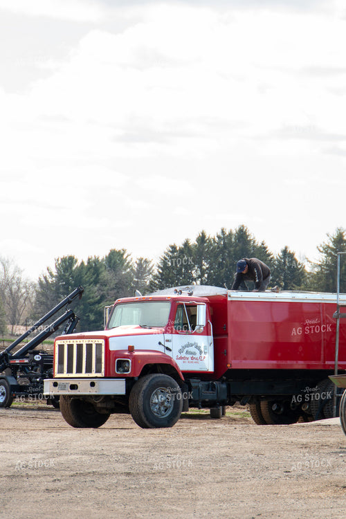 Farmer Working On Truck 157300