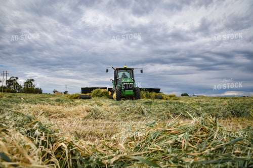 Tractor with Merger in Hay Field 56426