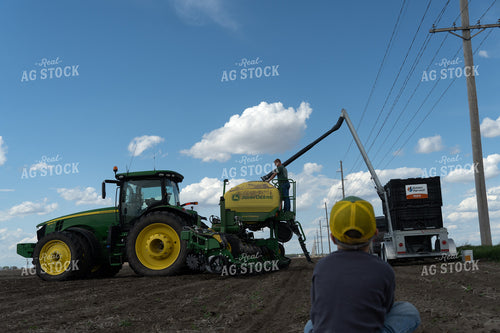 Farm Kid Watching Farmer Fill Planter 65415