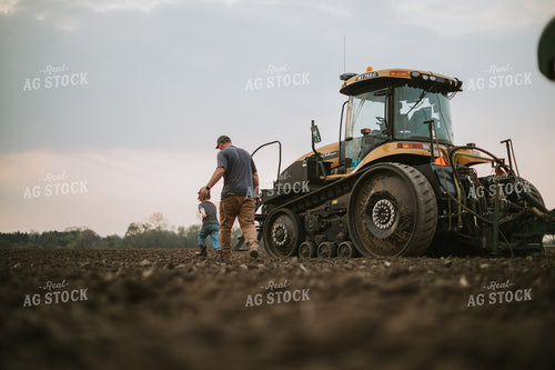Farmer Walking Toward Planter Tractor with Farm Kid 5665