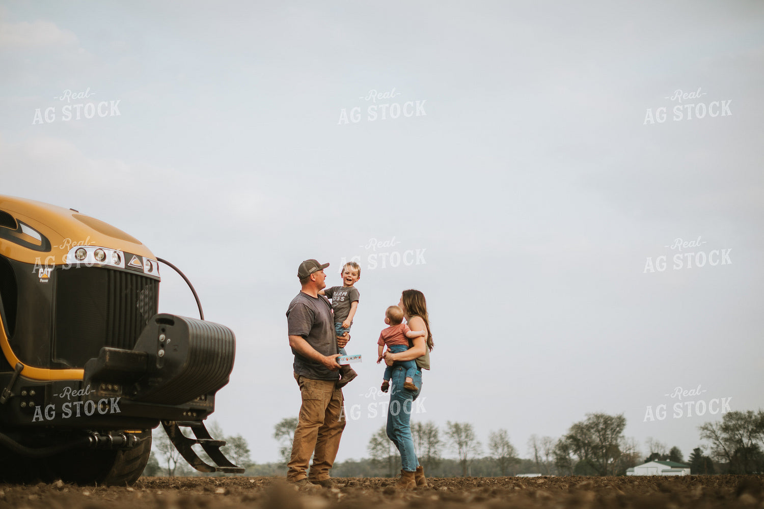Farm Mom Taking Kids Out to Tractor During Planting 5642