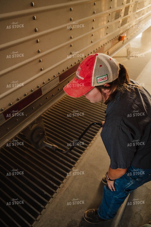 Female Farmer Dumping Semi 115258