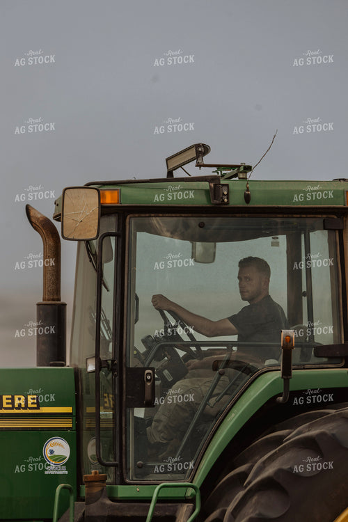 Farmer Driving Tractor 187219