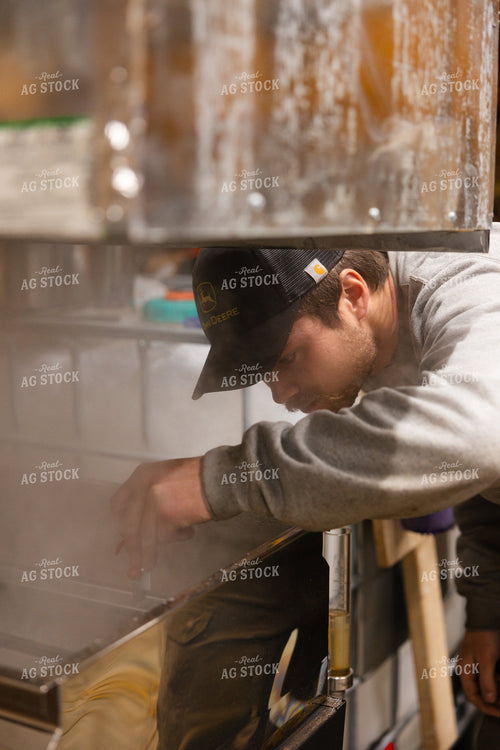 Farmer Cooking Maple Syrup 52812