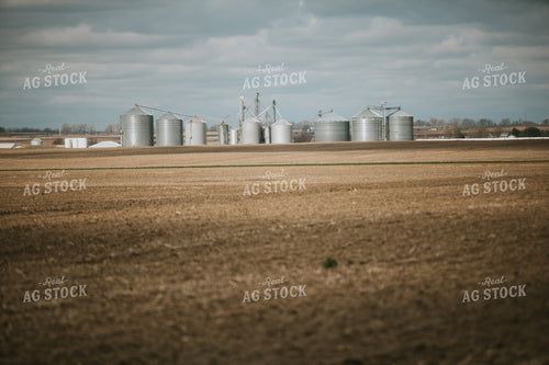 Unplanted Field in Spring with Grain Bins 5405