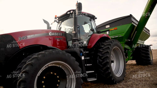 Farmer Climbing out of Tractor Cab - 495