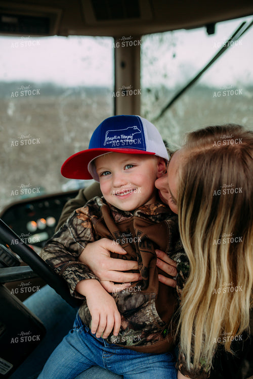 Farm Family in Tractor Cab 169066